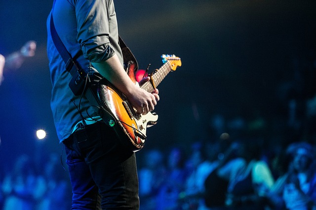 Man playing an electric guitar.